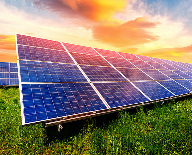 Solar panels at sunset